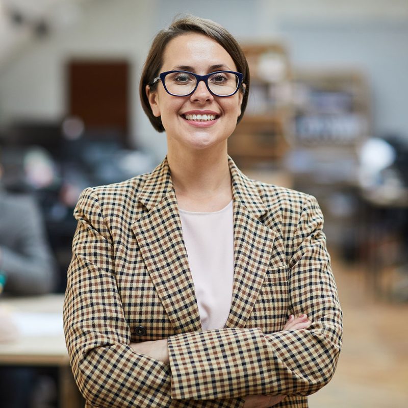 successful-businesswoman-posing-in-office.jpg